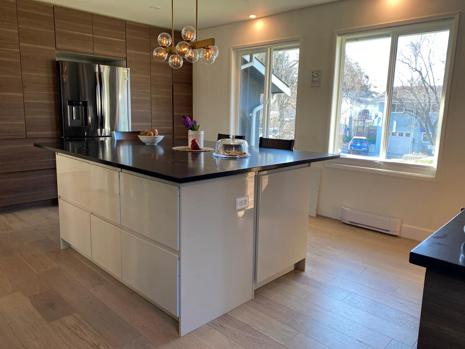 Completed kitchen renovation showing new plumbing and fixtures in Victoria BC home transformation